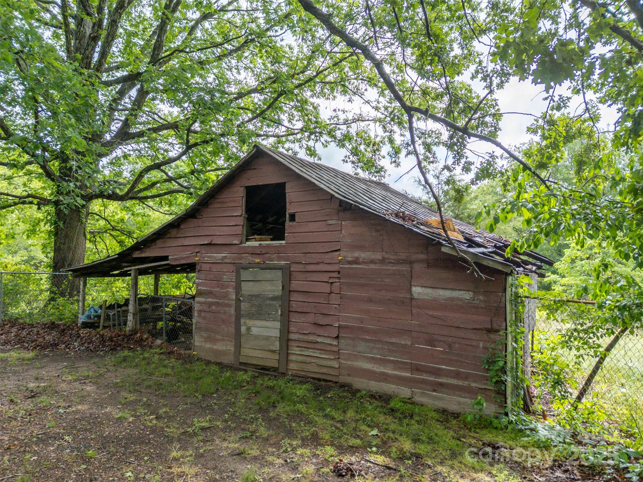 751 Ted Smith Road Rutherfordton, NC 28139 - Photo 30 of 36 a backyard of a house with lots of green space