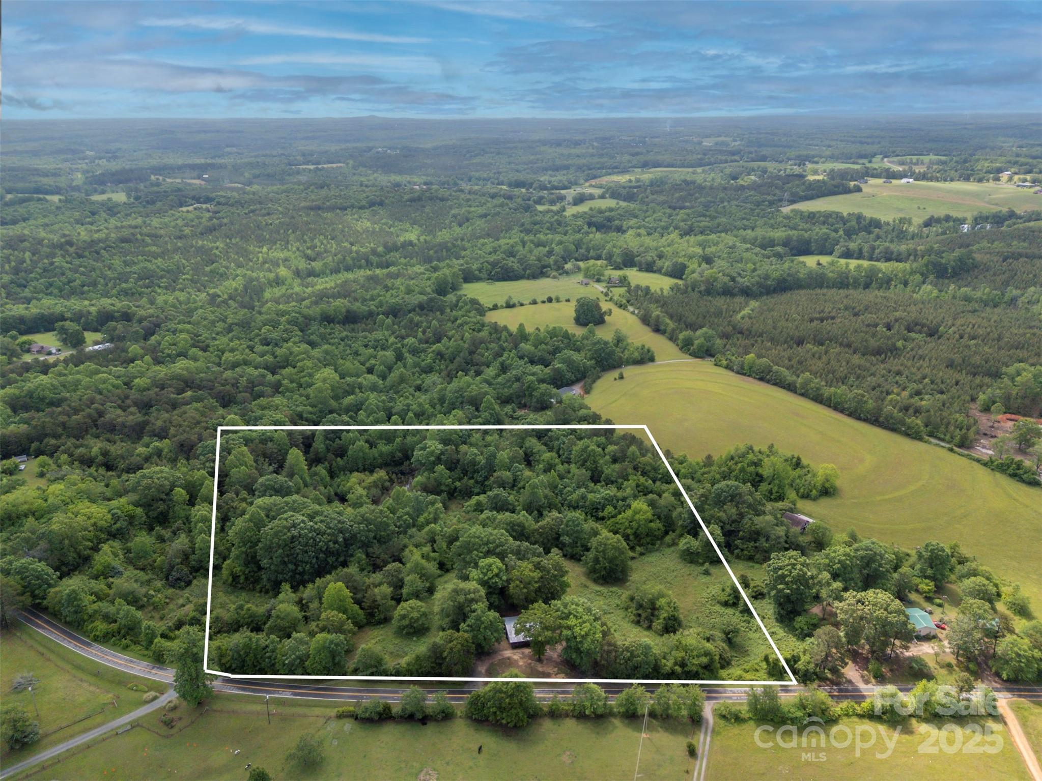 751 Ted Smith Road Rutherfordton, NC 28139 - Photo 5 of 36 a view of a yard from a balcony