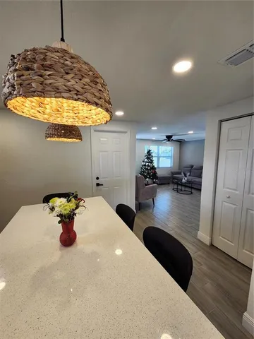a kitchen with a sink and a refrigerator