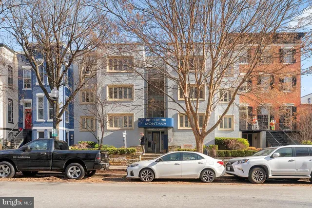 a car parked in front of a building
