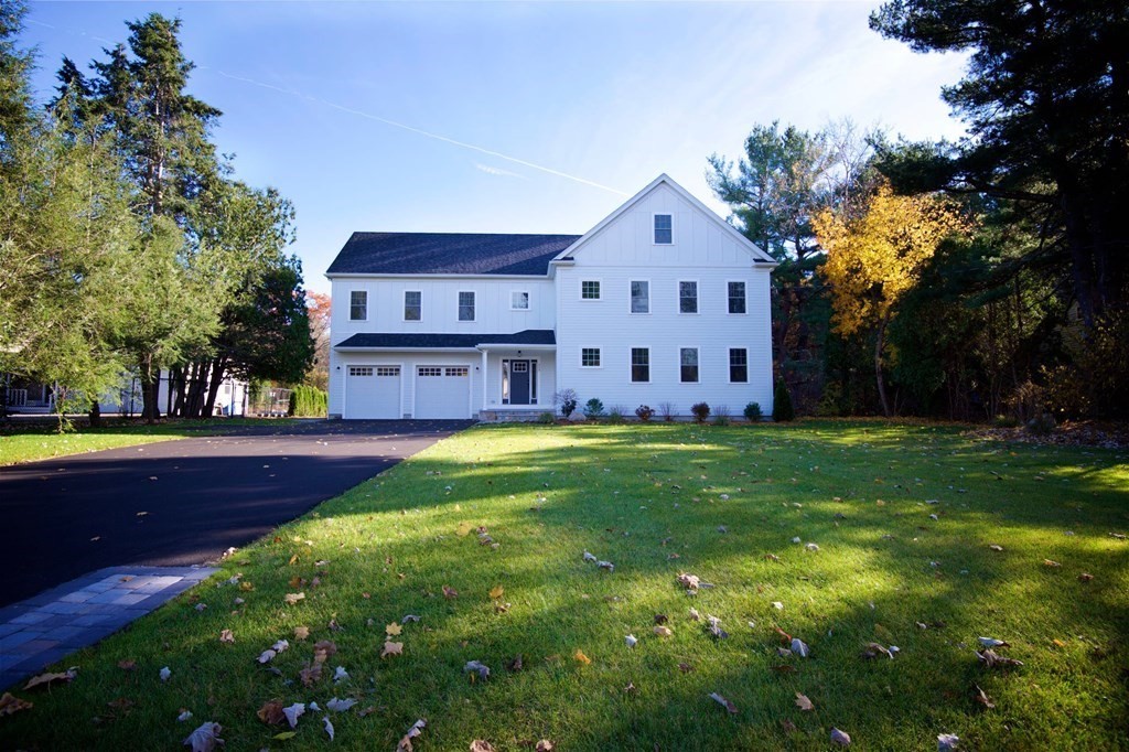 324 Concord Road Bedford, MA 01730 - Photo 2 of 42 a view of house with yard