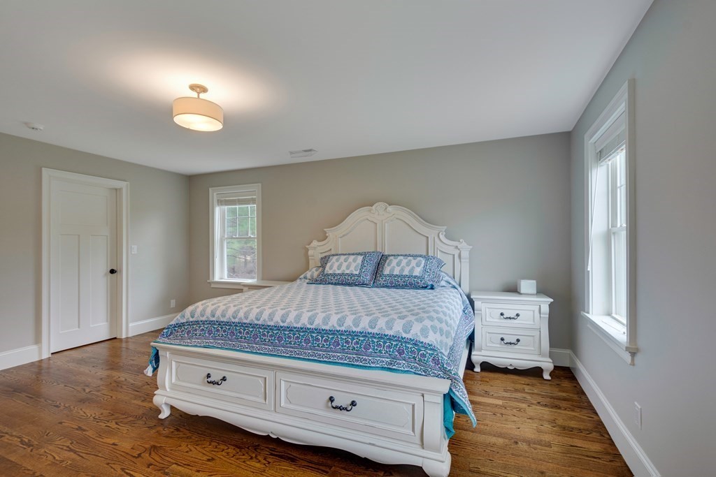 324 Concord Road Bedford, MA 01730 - Photo 35 of 42 a bedroom with a bed and a window