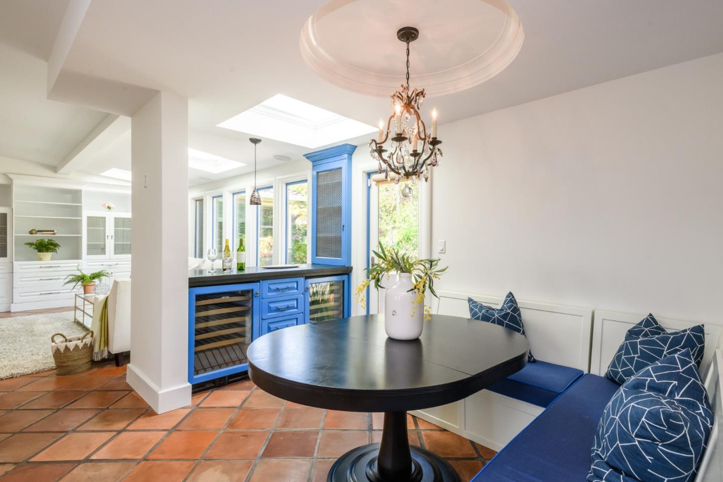 835 Longview Road Hillsborough, CA 94010 - Photo 14 of 46 a view of a dining room with furniture and wooden floor
