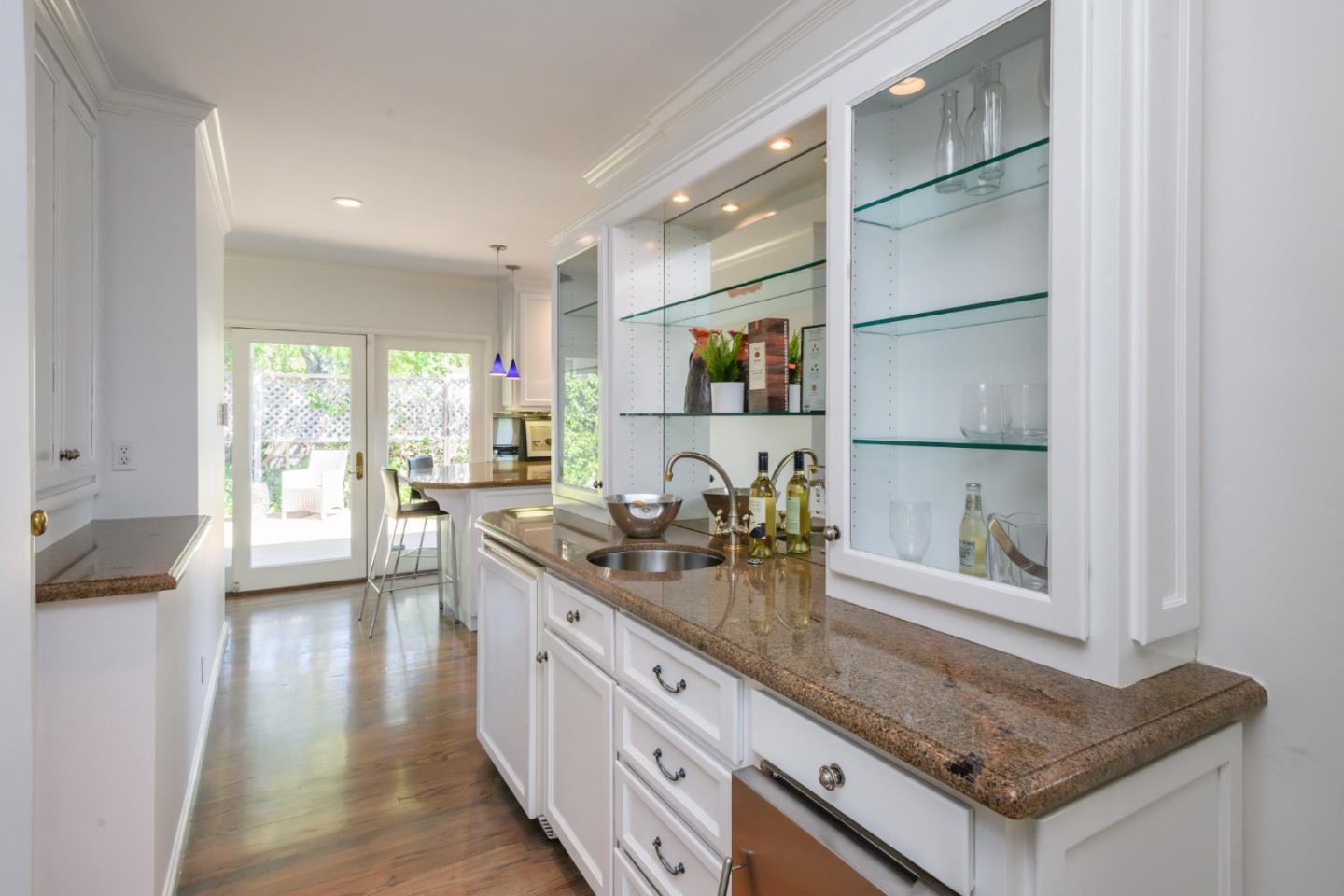 835 Longview Road Hillsborough, CA 94010 - Photo 15 of 46 a kitchen with stainless steel appliances granite countertop a sink stove and cabinets