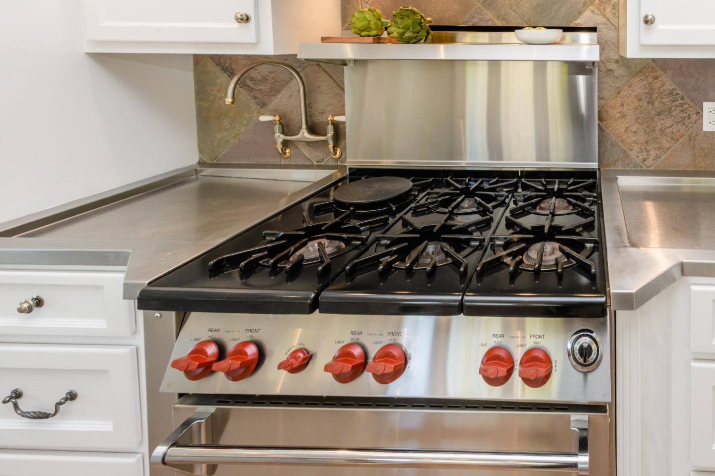 835 Longview Road Hillsborough, CA 94010 - Photo 19 of 46 a close view of stove and microwave