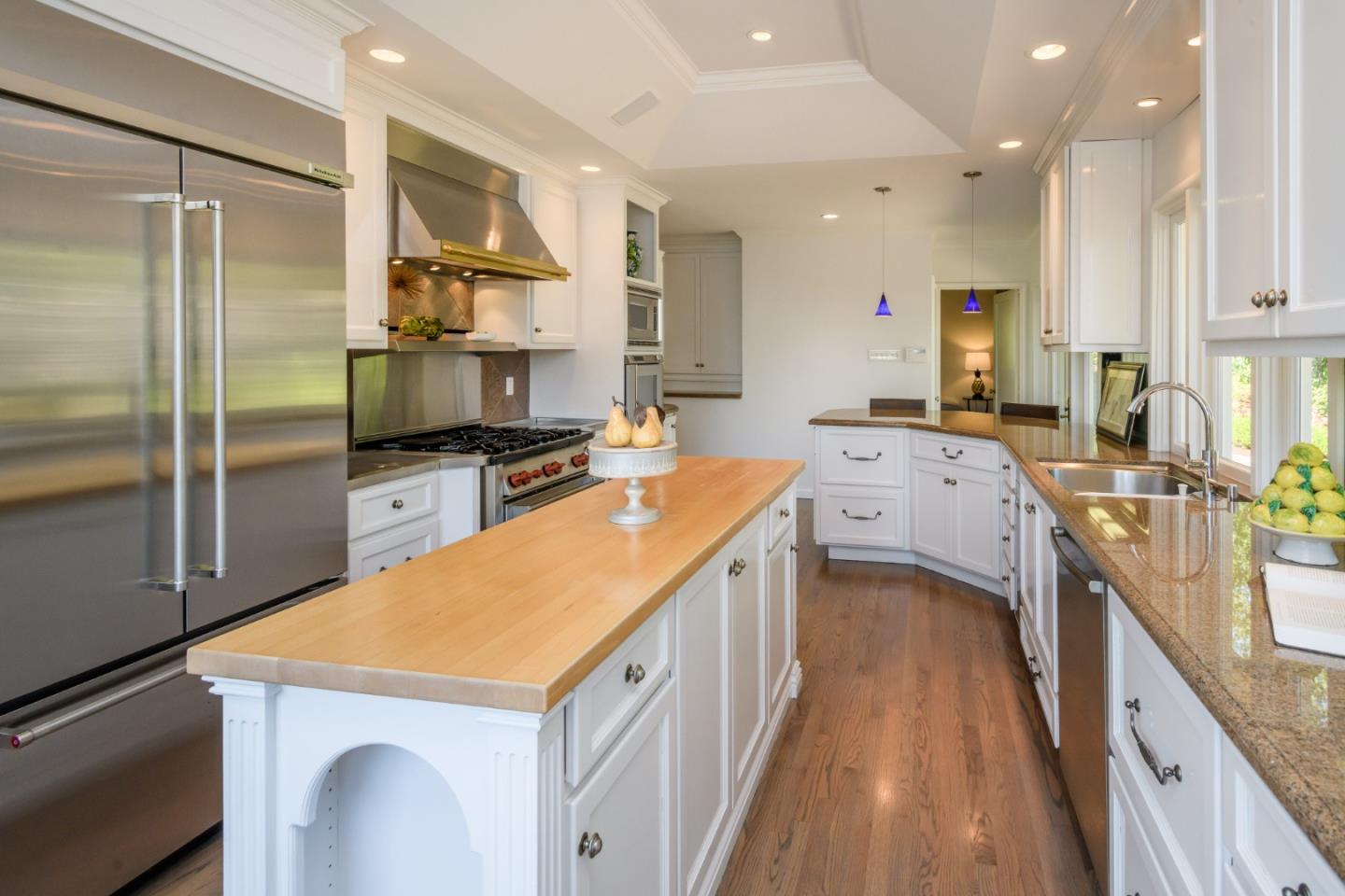 835 Longview Road Hillsborough, CA 94010 - Photo 20 of 46 a kitchen with a sink stove and refrigerator