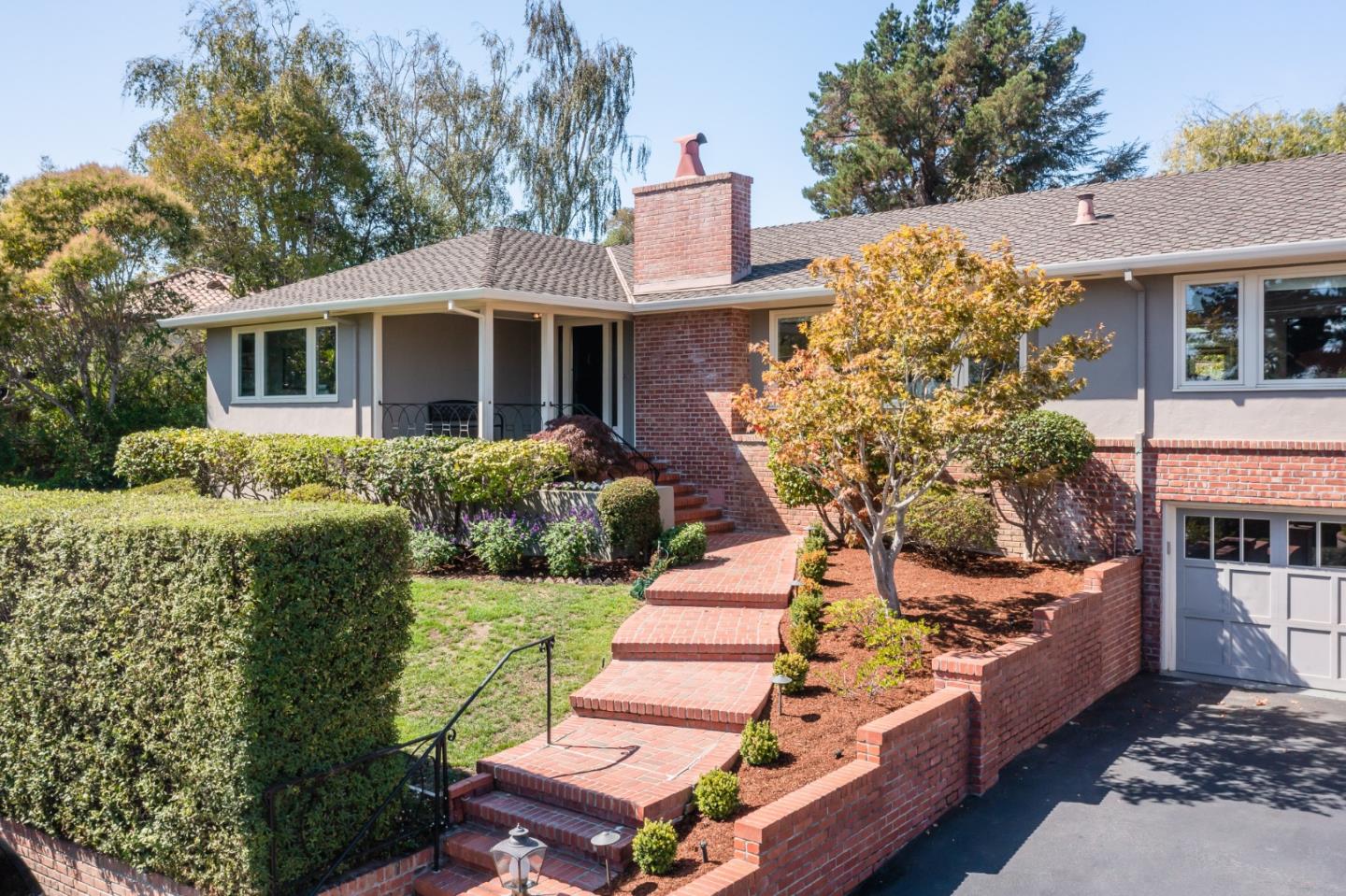 835 Longview Road Hillsborough, CA 94010 - Photo 2 of 46 a front view of a house with garden