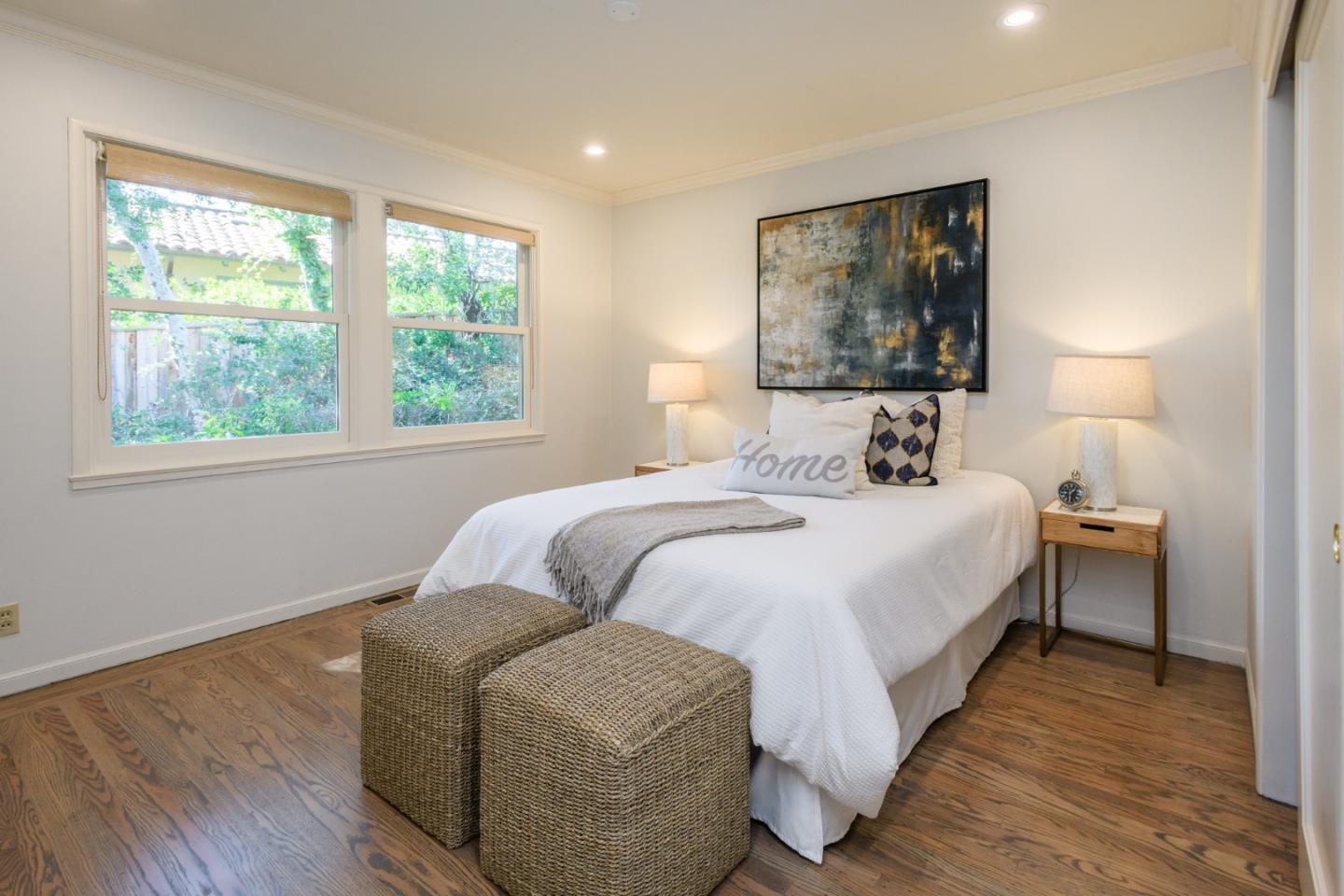 835 Longview Road Hillsborough, CA 94010 - Photo 30 of 46 a bedroom with a bed and a painting on the wall