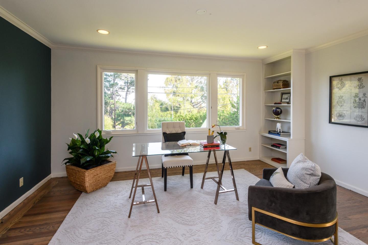835 Longview Road Hillsborough, CA 94010 - Photo 31 of 46 a workspace with furniture and a potted plant