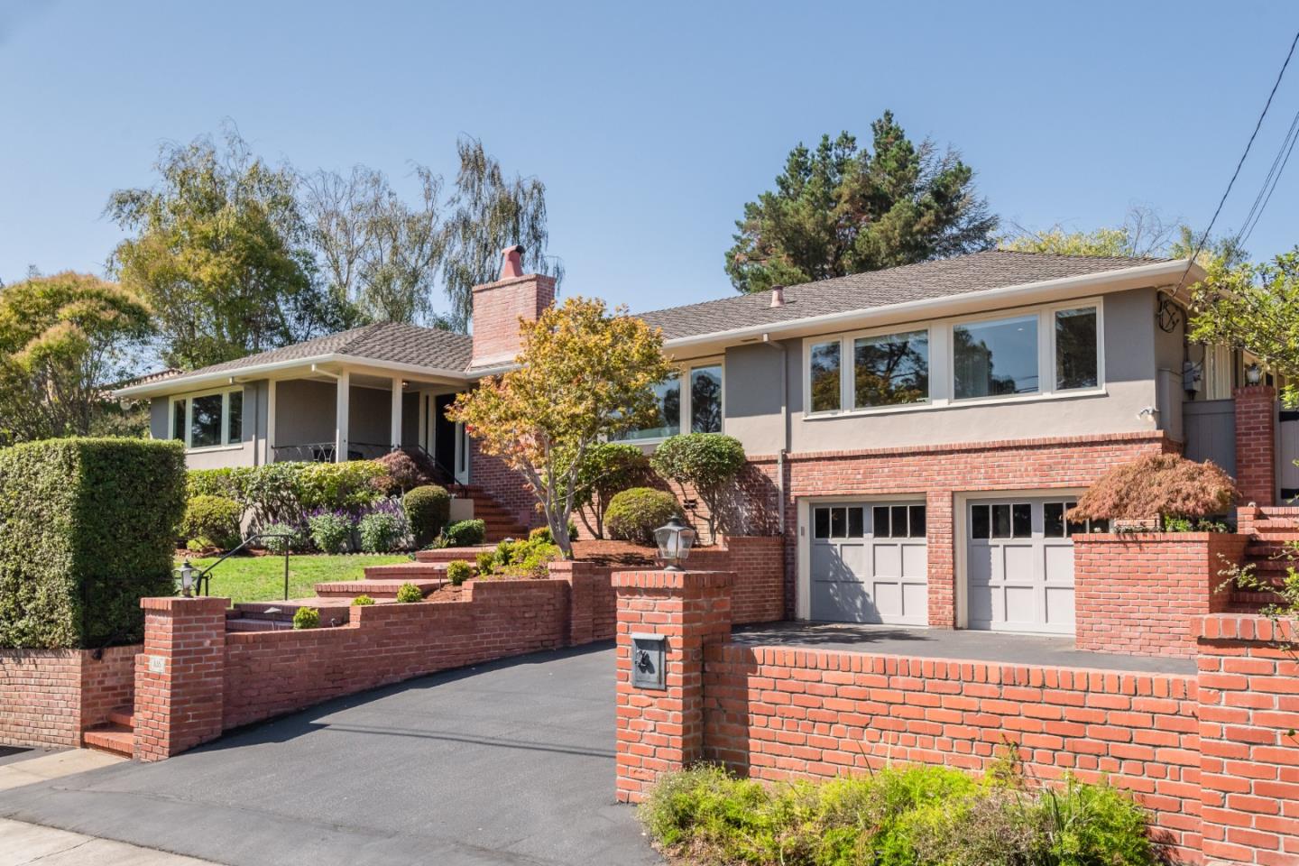 835 Longview Road Hillsborough, CA 94010 - Photo 35 of 46 a front view of a house with a yard