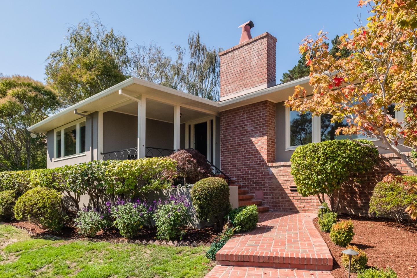 835 Longview Road Hillsborough, CA 94010 - Photo 36 of 46 a front view of a house with a yard