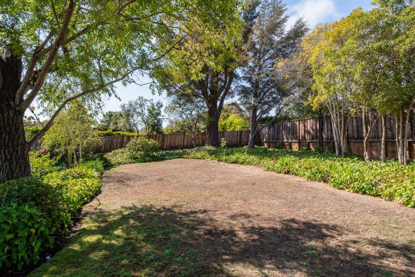 835 Longview Road Hillsborough, CA 94010 - Photo 44 of 46 a view of a yard with plants and trees