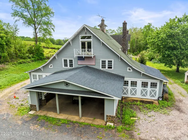 a house with trees in the background