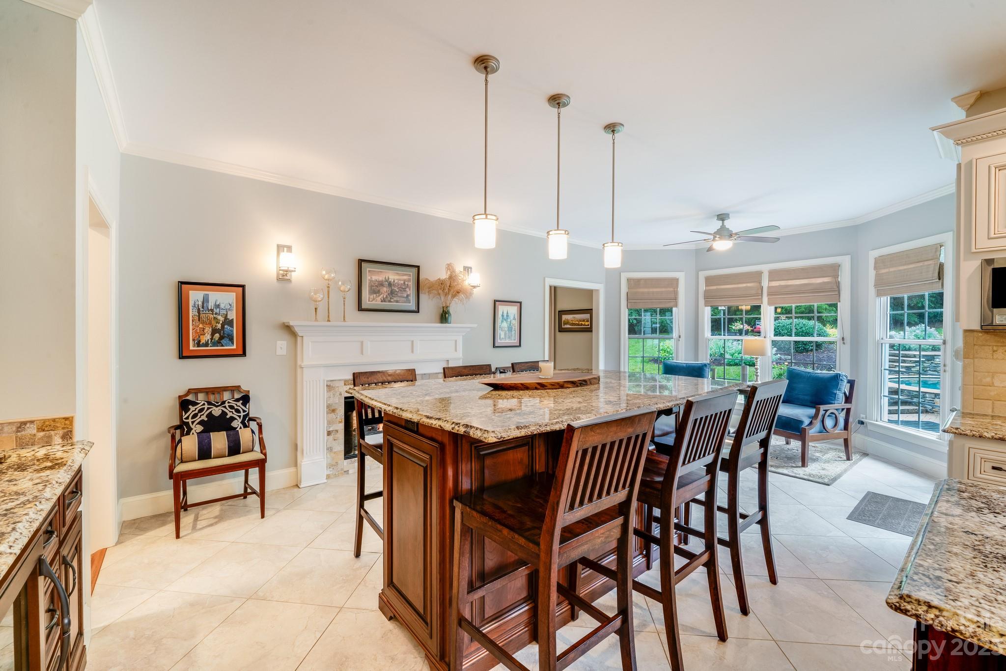 123 Lake Pointe Drive Fort Mill, SC 29708 - Photo 21 of 46 a view of a dining room with furniture window and outside view