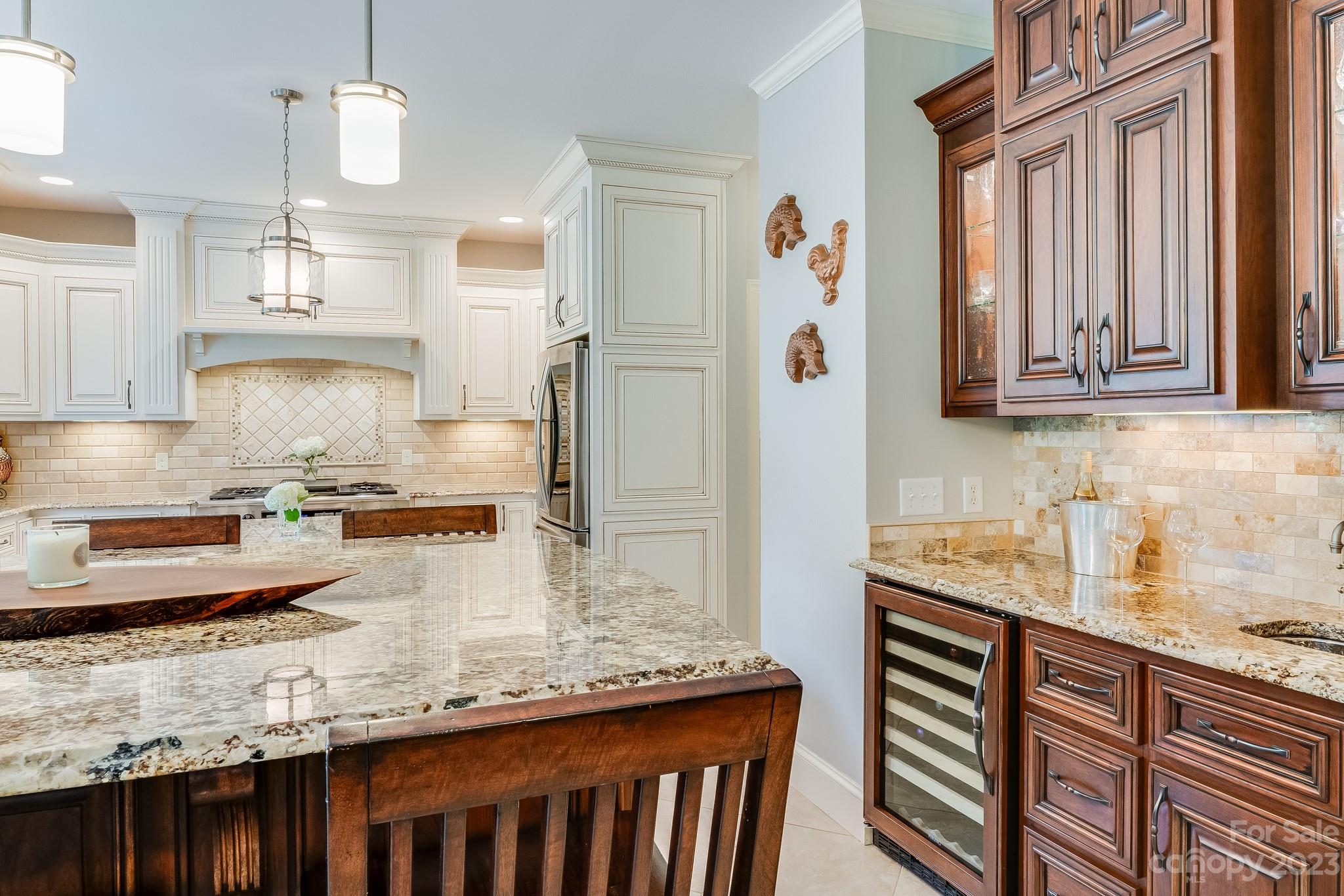 123 Lake Pointe Drive Fort Mill, SC 29708 - Photo 24 of 46 a kitchen with granite countertop a sink a stove and cabinets