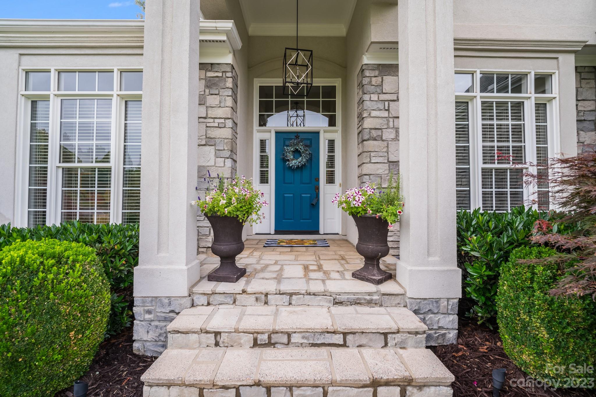 123 Lake Pointe Drive Fort Mill, SC 29708 - Photo 3 of 46 a view of a building with potted plants