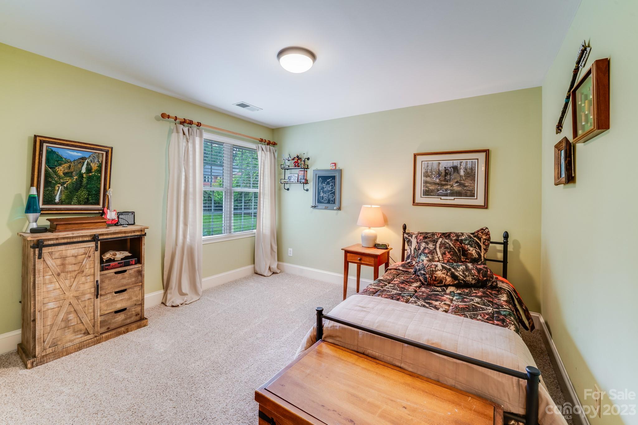 123 Lake Pointe Drive Fort Mill, SC 29708 - Photo 38 of 46 a bedroom with furniture and a window