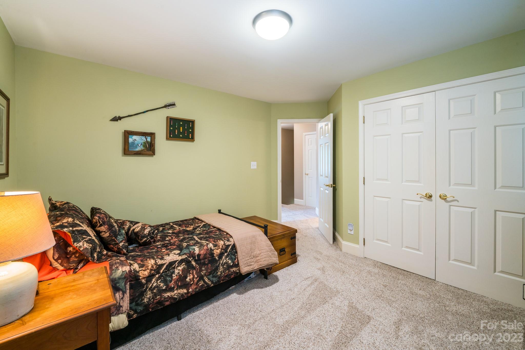 123 Lake Pointe Drive Fort Mill, SC 29708 - Photo 39 of 46 a bedroom with a bed and a window