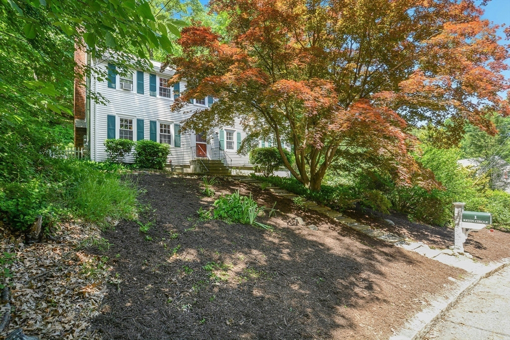 1 Kevin Circle Framingham, MA 01701 - Photo 21 of 25 a front view of a house with a yard
