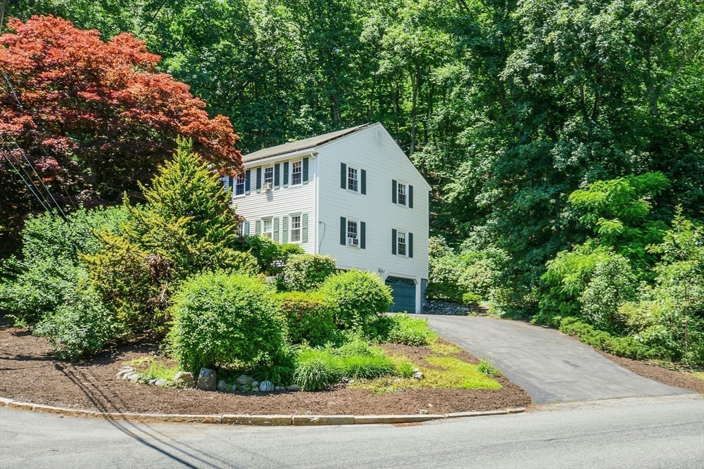 1 Kevin Circle Framingham, MA 01701 - Photo 22 of 25 a house with trees in the background