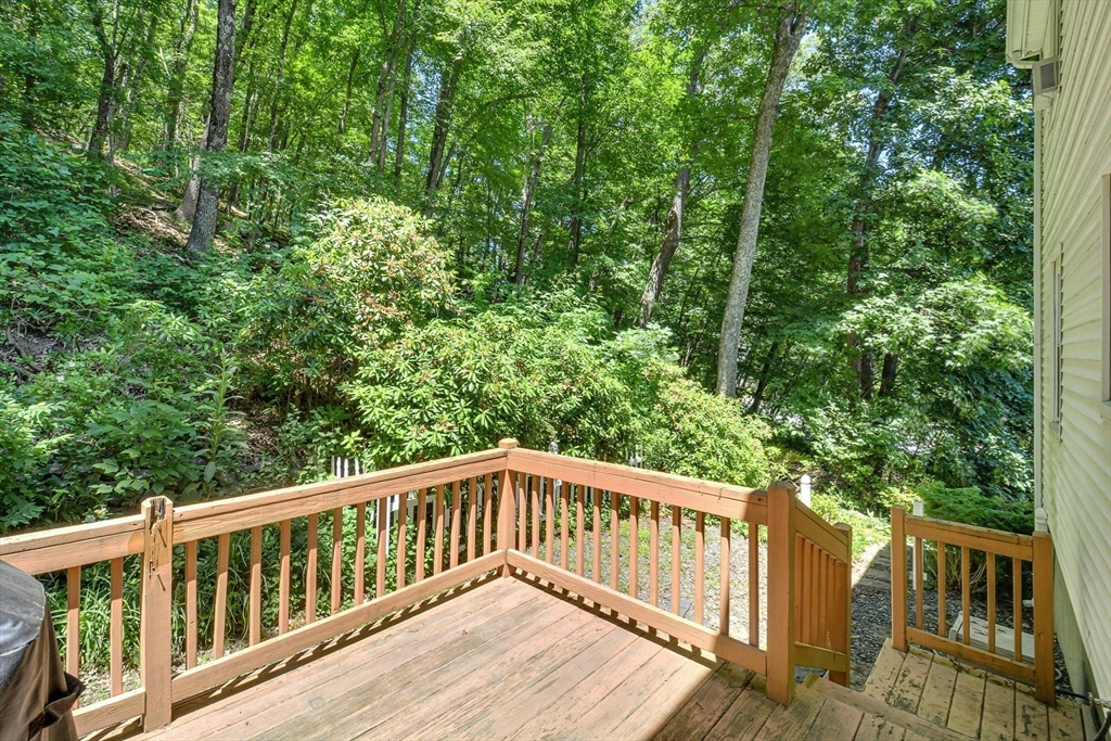 1 Kevin Circle Framingham, MA 01701 - Photo 23 of 25 a balcony with wooden floor and trees