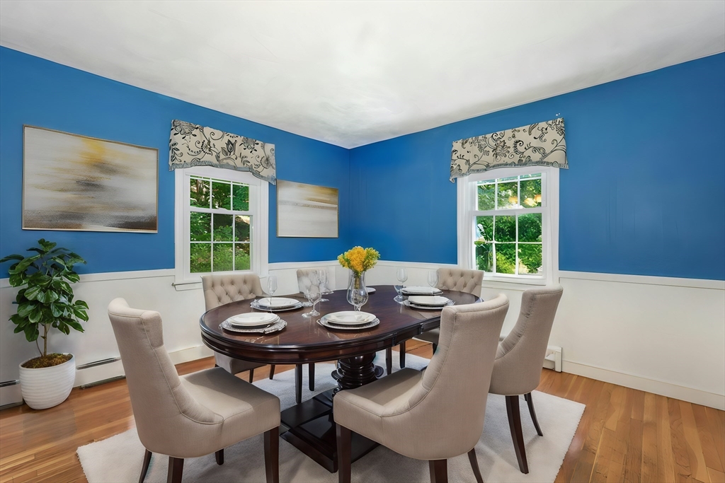 1 Kevin Circle Framingham, MA 01701 - Photo 5 of 25 a view of a dining room with furniture and wooden floor