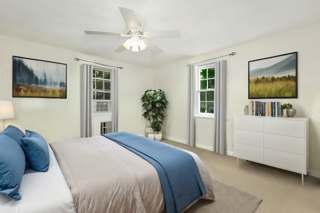 1 Kevin Circle Framingham, MA 01701 - Photo 8 of 25 a bedroom with a bed and a flat screen tv