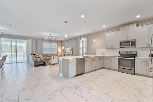 $850,000 | 8825 Cruden Bay Court, Davenport, FL 33896