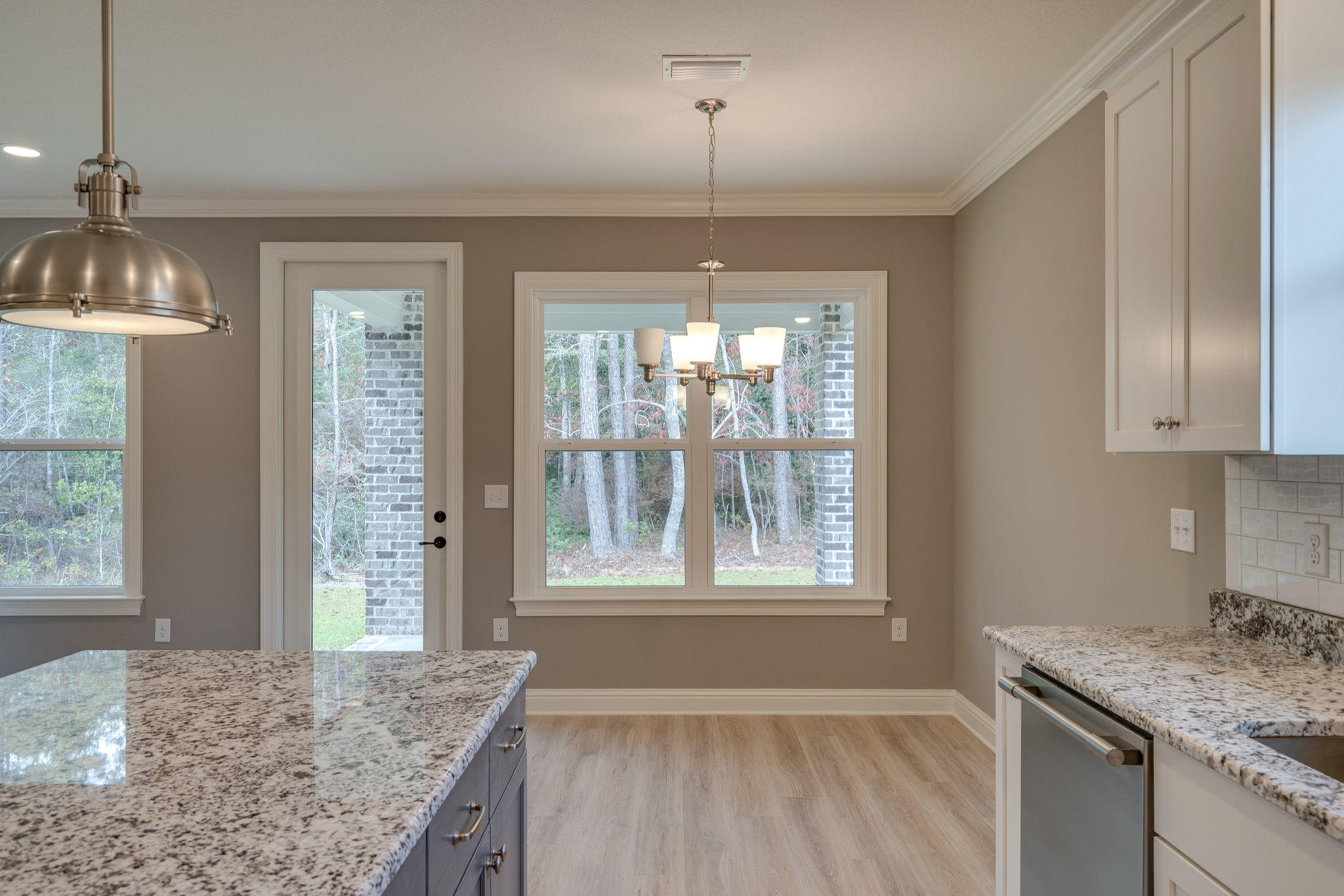 164 4 Mile Road Freeport, FL 32439 - Photo 2 of 6 Redfish dining and partial kitchen