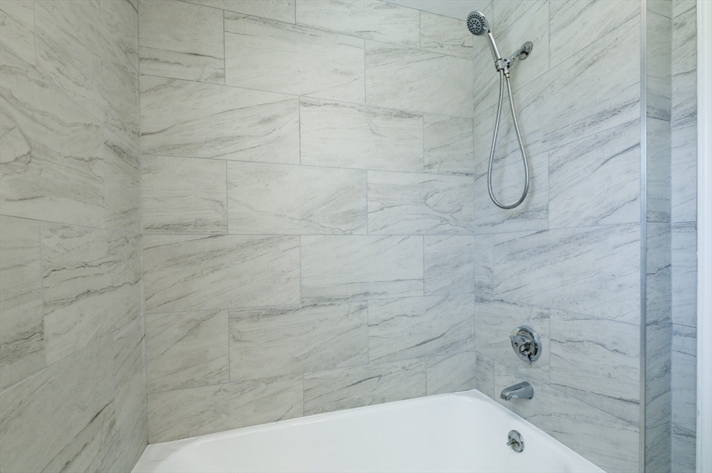 35 Marion Street Holbrook, MA 02343 - Photo 18 of 37 a bathroom with a bathtub