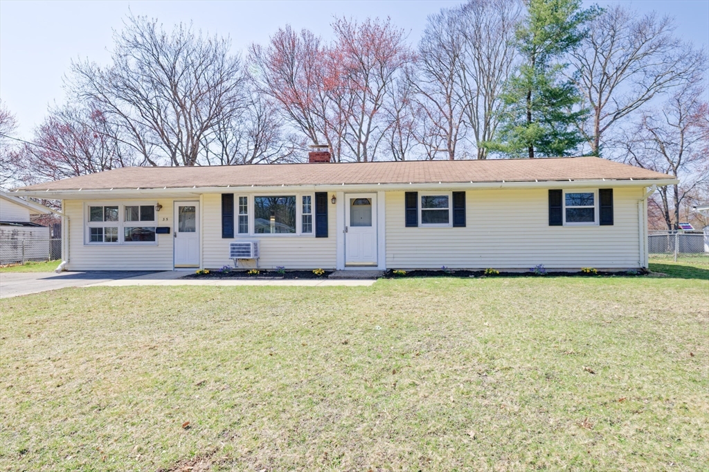 35 Marion Street Holbrook, MA 02343 - Photo 2 of 37 a view of a house with large windows and a big yard