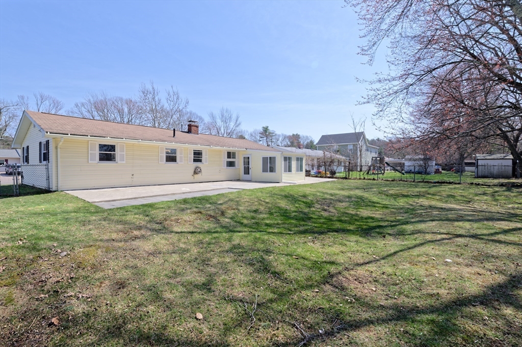 35 Marion Street Holbrook, MA 02343 - Photo 35 of 37 a view of a house with a big yard and large trees