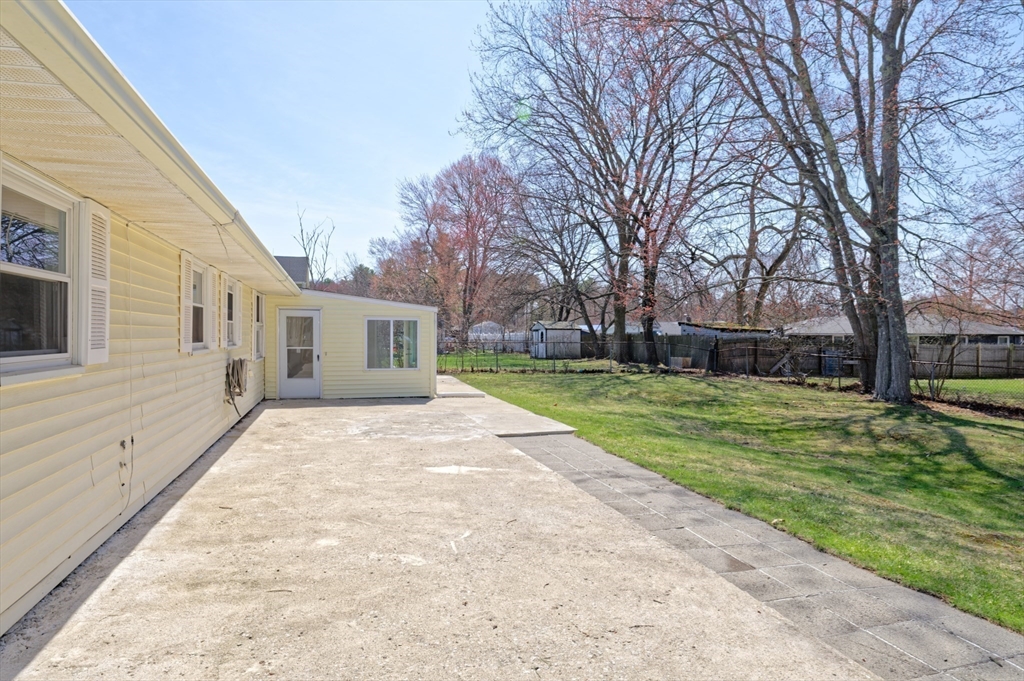 35 Marion Street Holbrook, MA 02343 - Photo 36 of 37 a front view of house with yard and green space