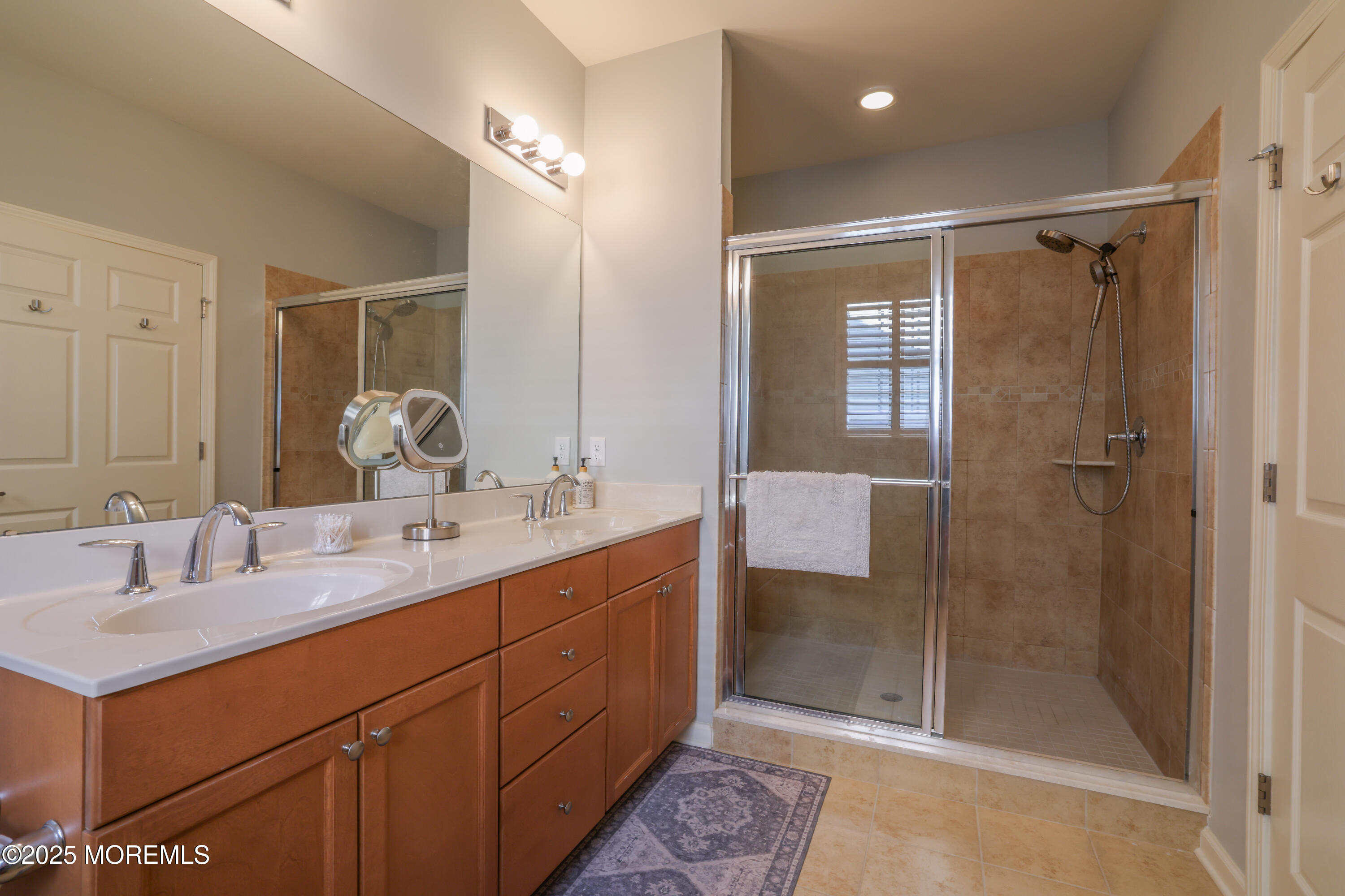 31 Garden Path Barnegat, NJ 08005 - Photo 21 of 43 a bathroom with a shower sink and mirror