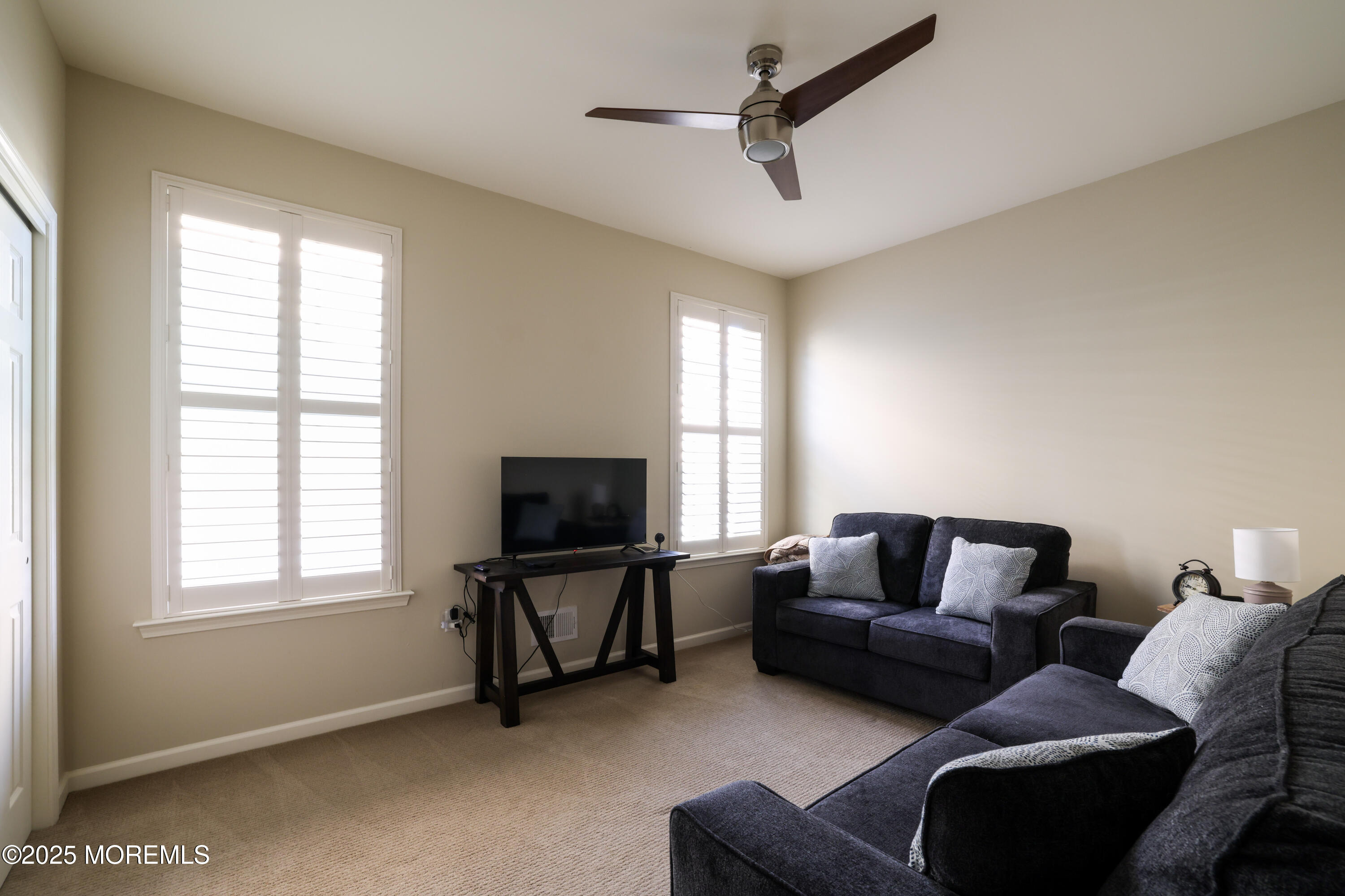 31 Garden Path Barnegat, NJ 08005 - Photo 22 of 43 a living room with furniture and a flat screen tv