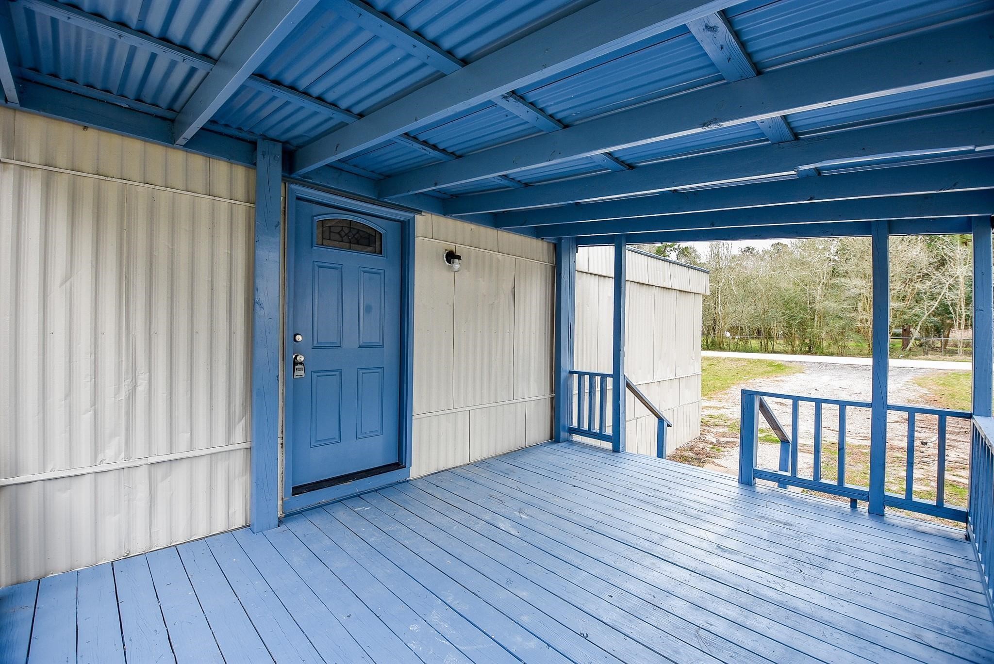 12842 Roy Harris Loop Conroe, TX 77306 - Photo 14 of 36 a view of hallway with wooden floor