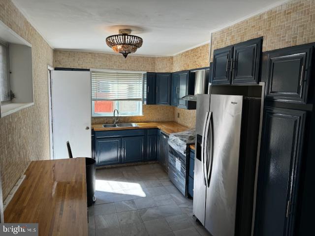 2434 South Percy Street Philadelphia, PA 19148 - Photo 3 of 13 a kitchen with stainless steel appliances granite countertop a refrigerator and a sink