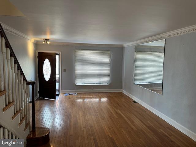 2434 South Percy Street Philadelphia, PA 19148 - Photo 4 of 13 a view of an empty room with wooden floor and a window