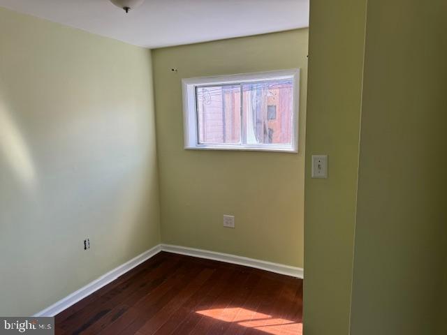 2434 South Percy Street Philadelphia, PA 19148 - Photo 8 of 13 a view of a small space with wooden floor and a window