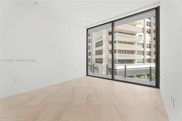 a front view of a building with glass windows