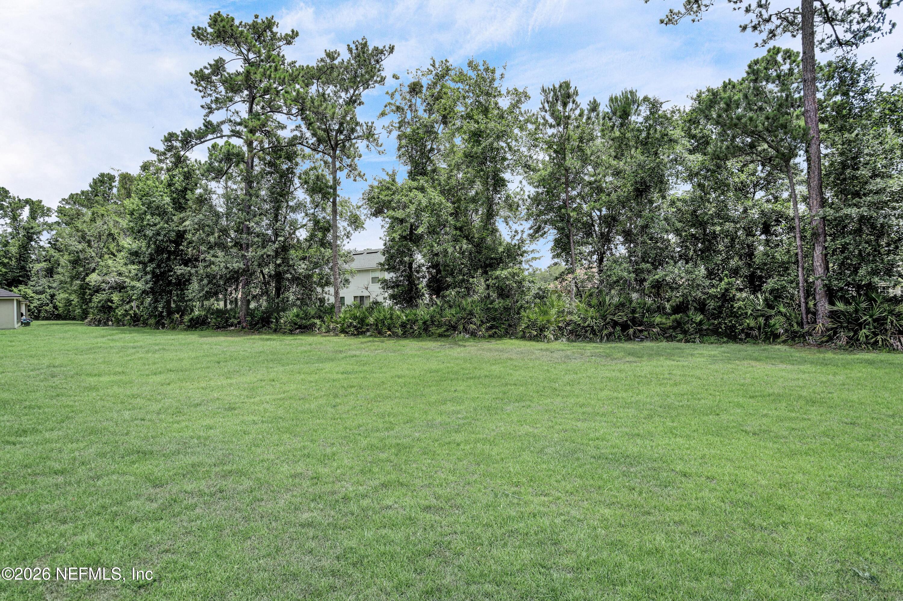 12271 Harts Road Jacksonville, FL 32218 - Photo 17 of 17 a view of a field with trees