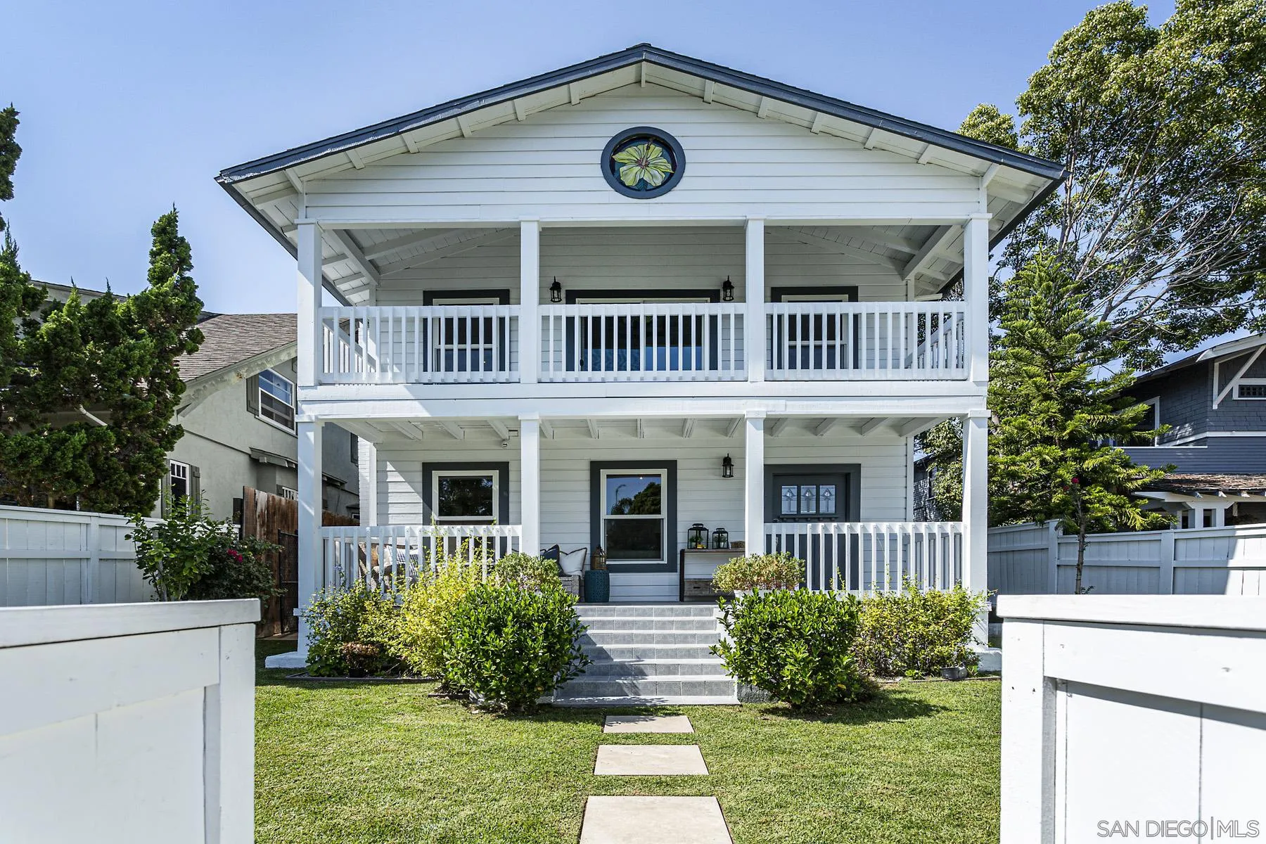 340 A Avenue Coronado, CA 92118 - Photo 1 of 41 a front view of a house with garden