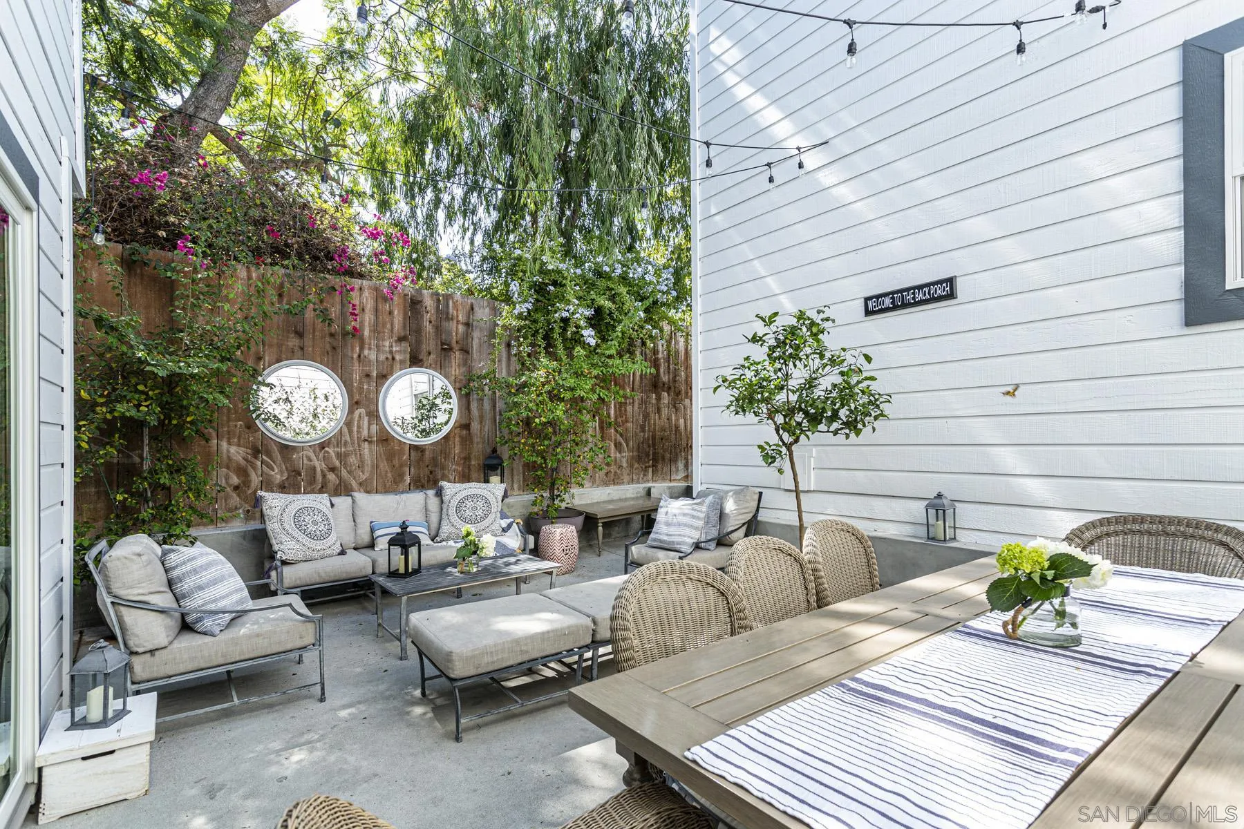 340 A Avenue Coronado, CA 92118 - Photo 14 of 41 a living room with furniture and a potted plant