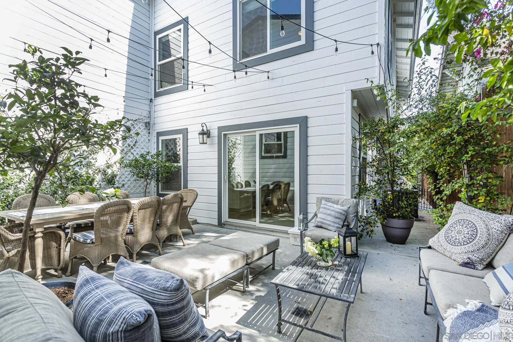 340 A Avenue Coronado, CA 92118 - Photo 16 of 41 a view of backyard with outdoor seating