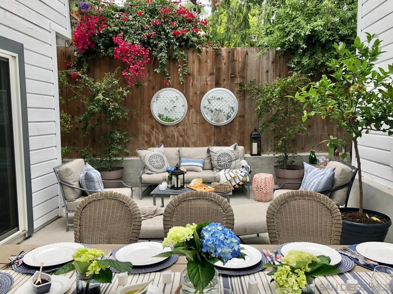 340 A Avenue Coronado, CA 92118 - Photo 17 of 41 a living room with furniture and flowers