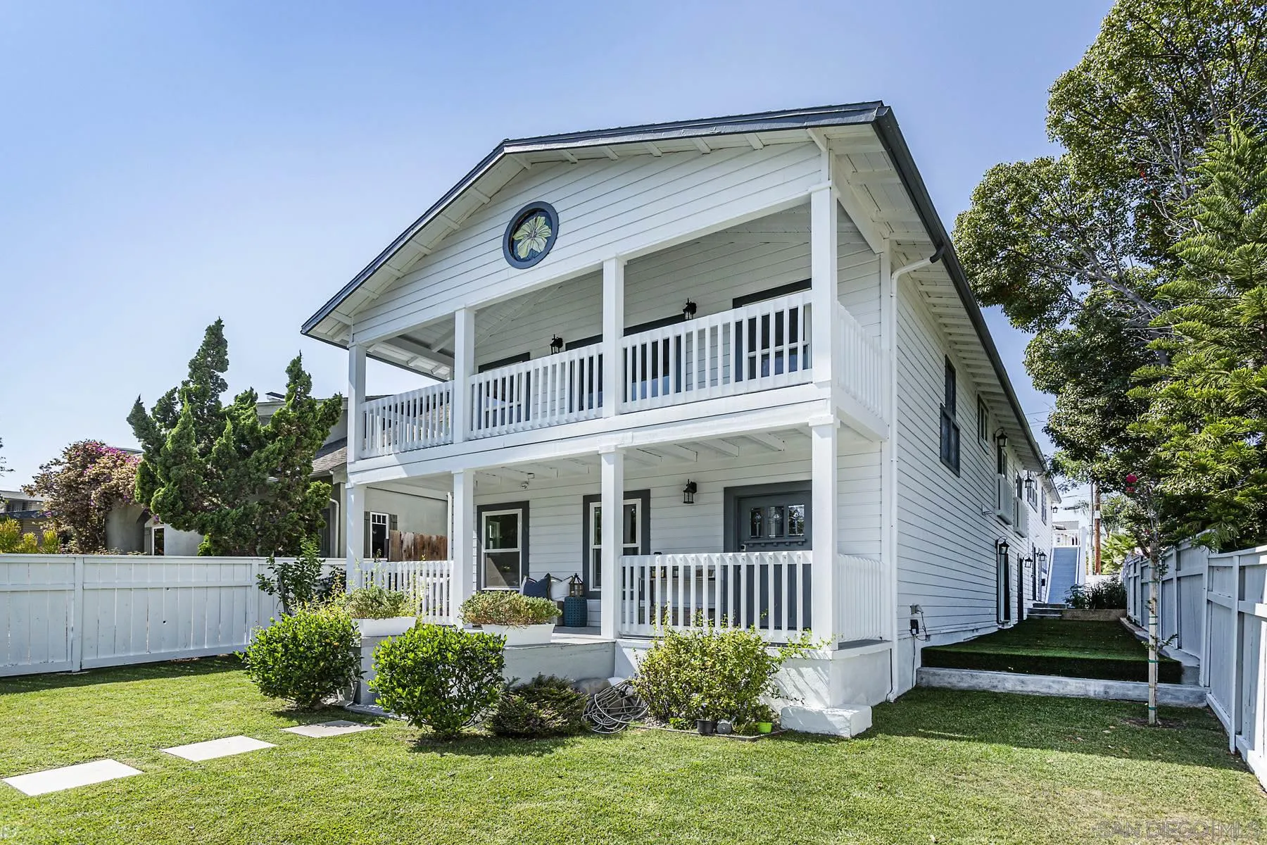340 A Avenue Coronado, CA 92118 - Photo 2 of 41 a front view of a house with a yard