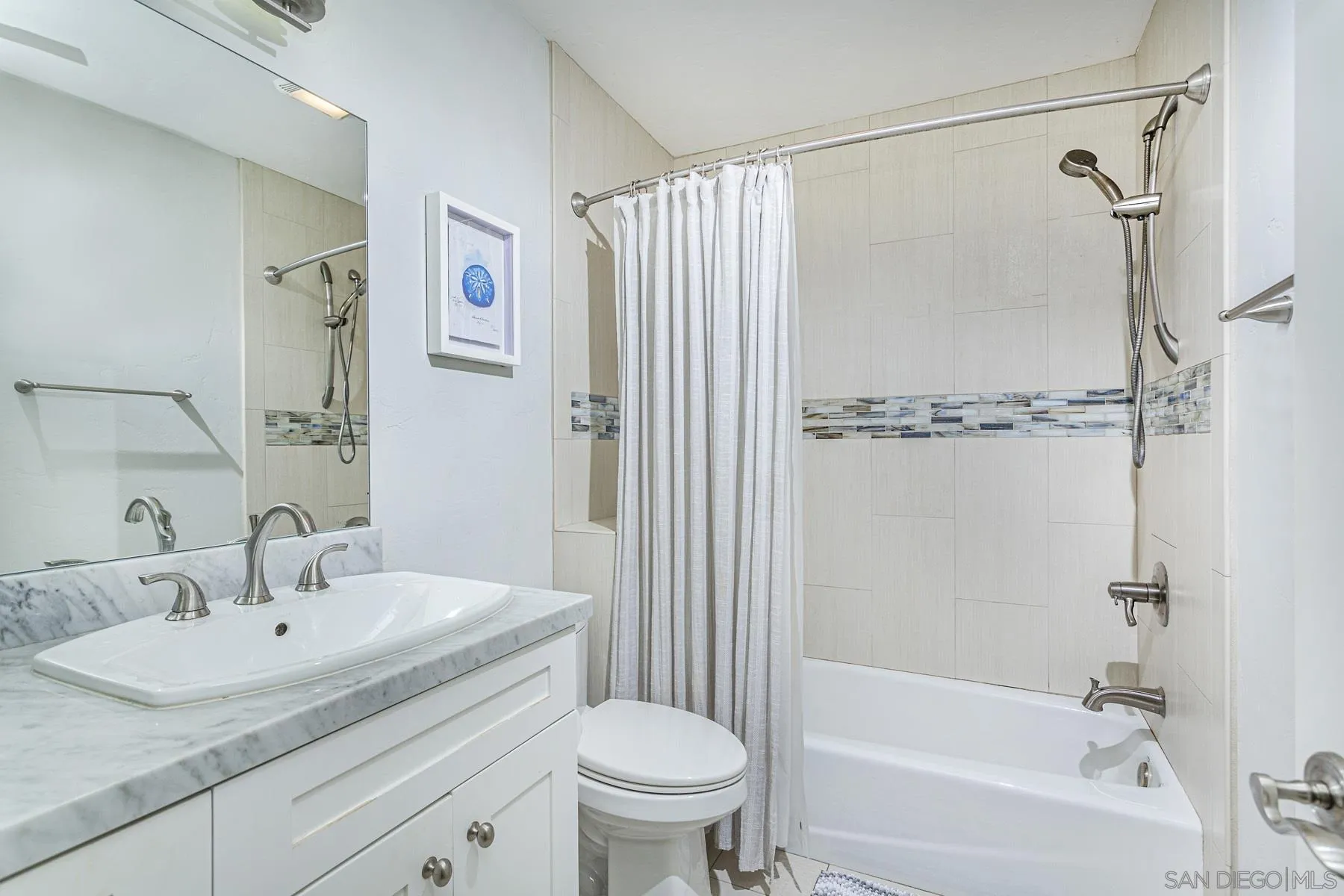 340 A Avenue Coronado, CA 92118 - Photo 22 of 41 a bathroom with a sink toilet and shower