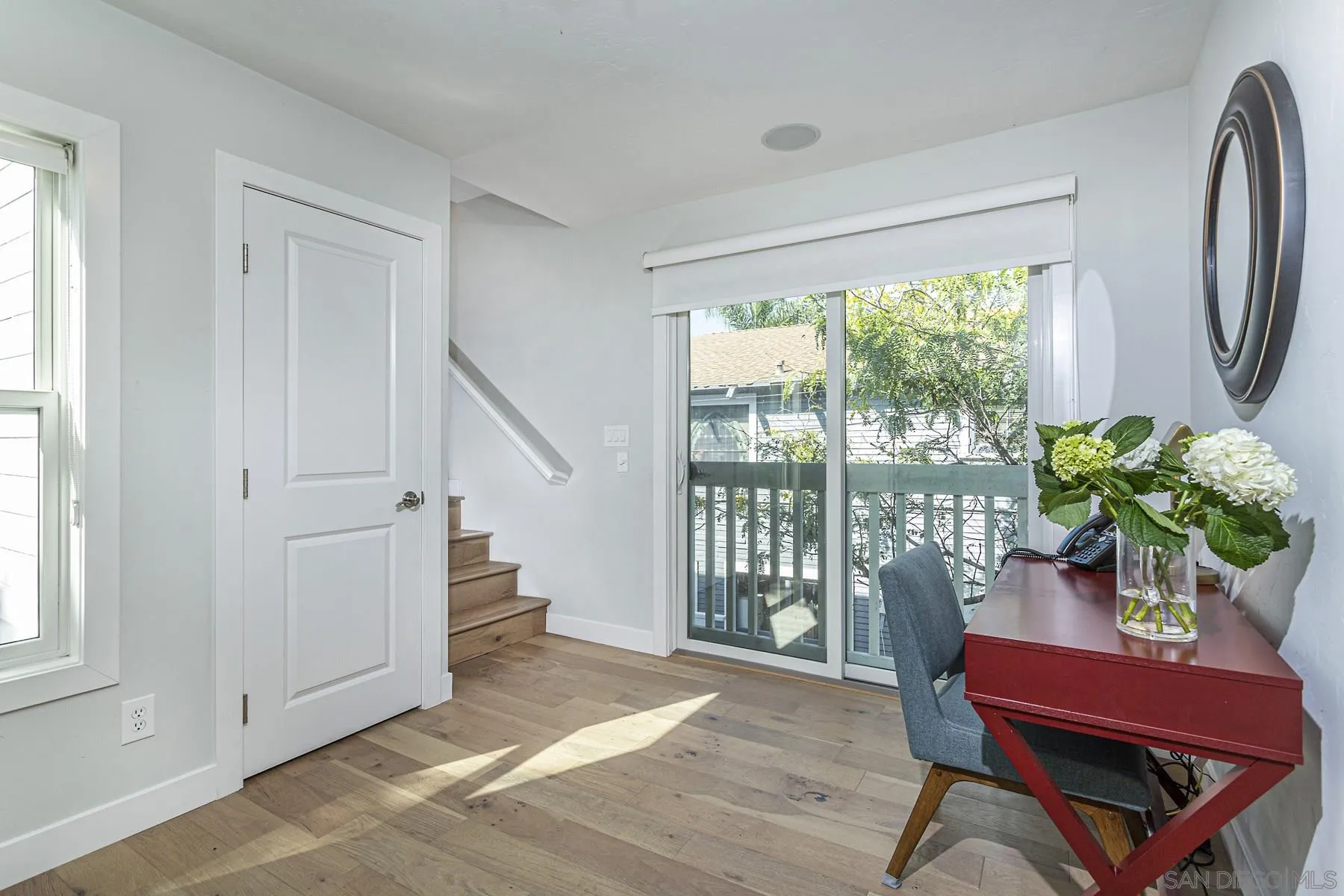 340 A Avenue Coronado, CA 92118 - Photo 33 of 41 a living room with furniture and a potted plant