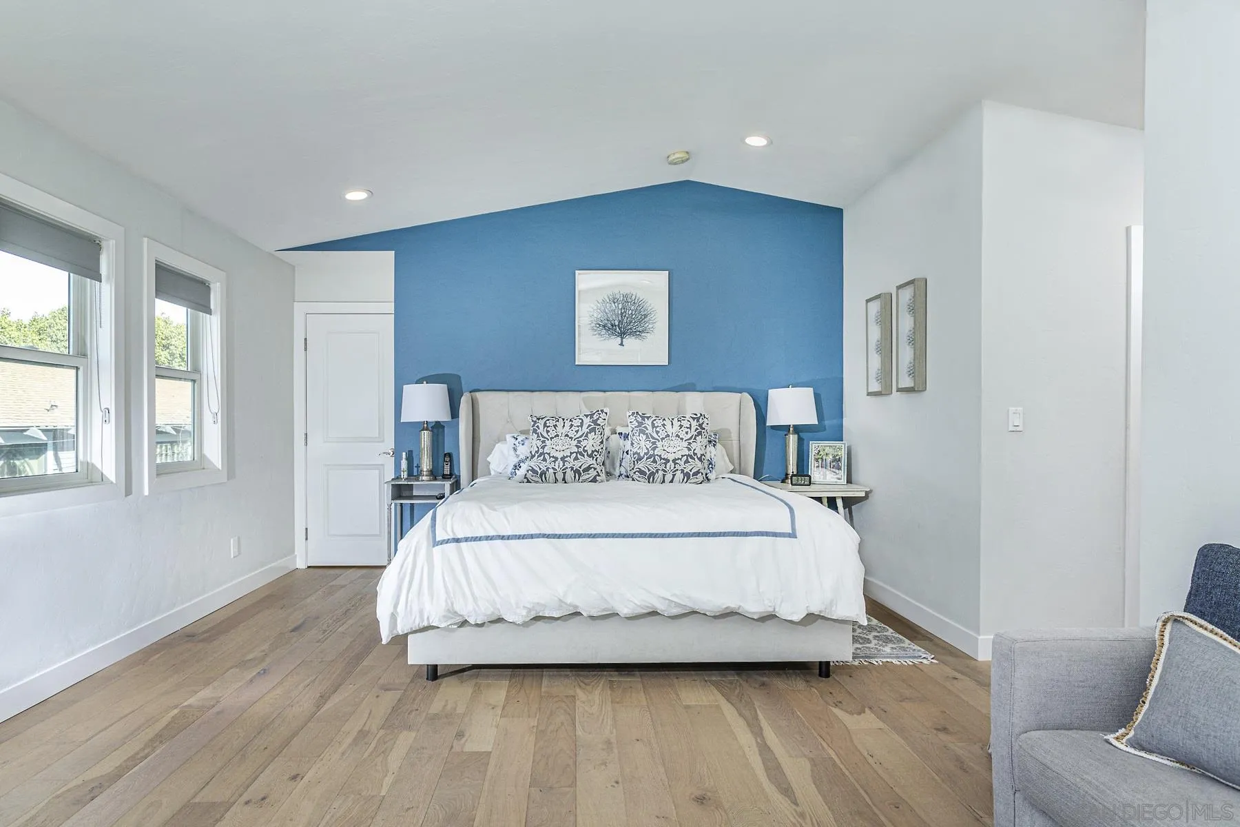 340 A Avenue Coronado, CA 92118 - Photo 37 of 41 a spacious bedroom with a bed and a couch