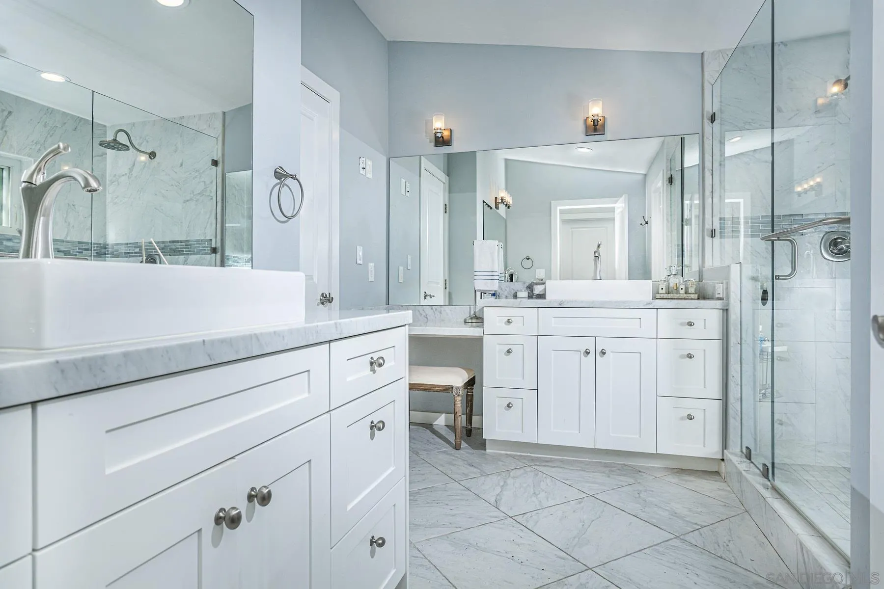 340 A Avenue Coronado, CA 92118 - Photo 38 of 41 a spacious bathroom with a shower sink mirror and